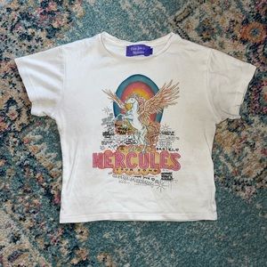 REALISATION PAR ELTON JOHN HERCULES TEE